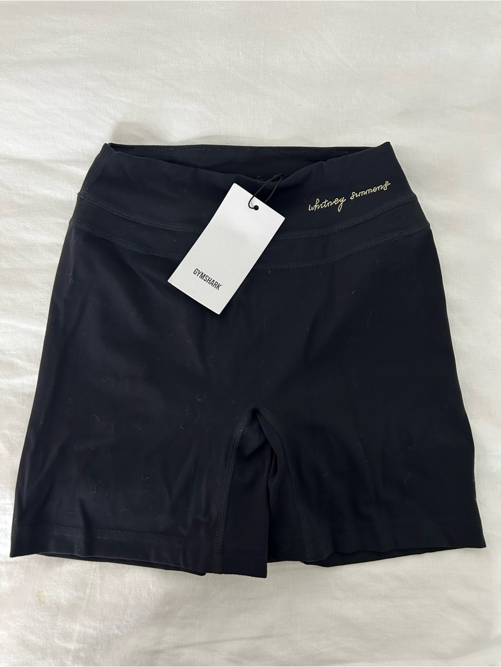 Gymshark Black High-Rise Bike Shorts with Gold Script
